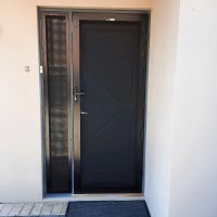 Invisi-gard front door with side-lite
